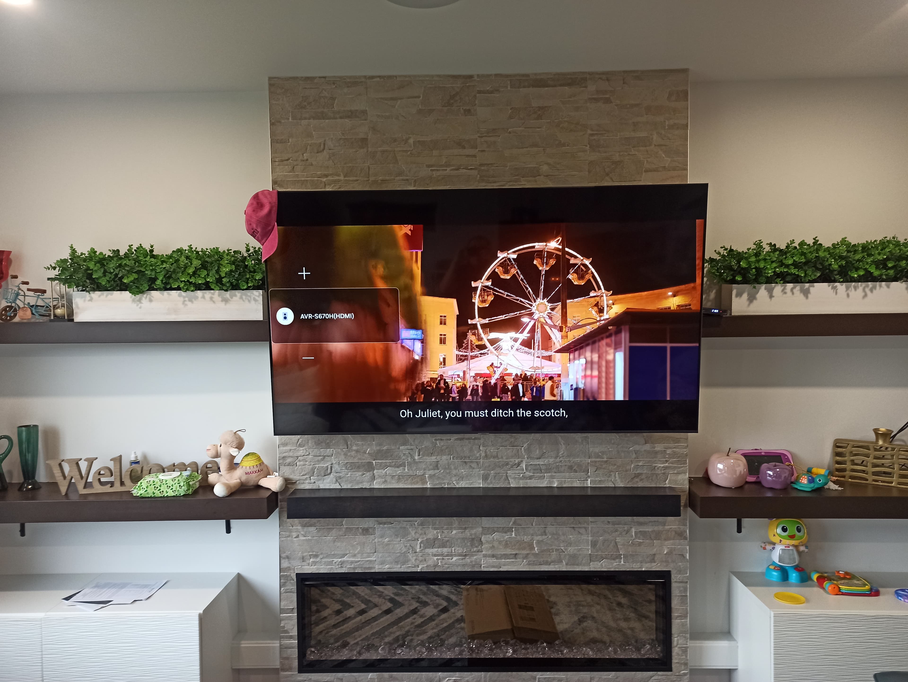 Residential TV installation Winnipeg - large TV above fireplace