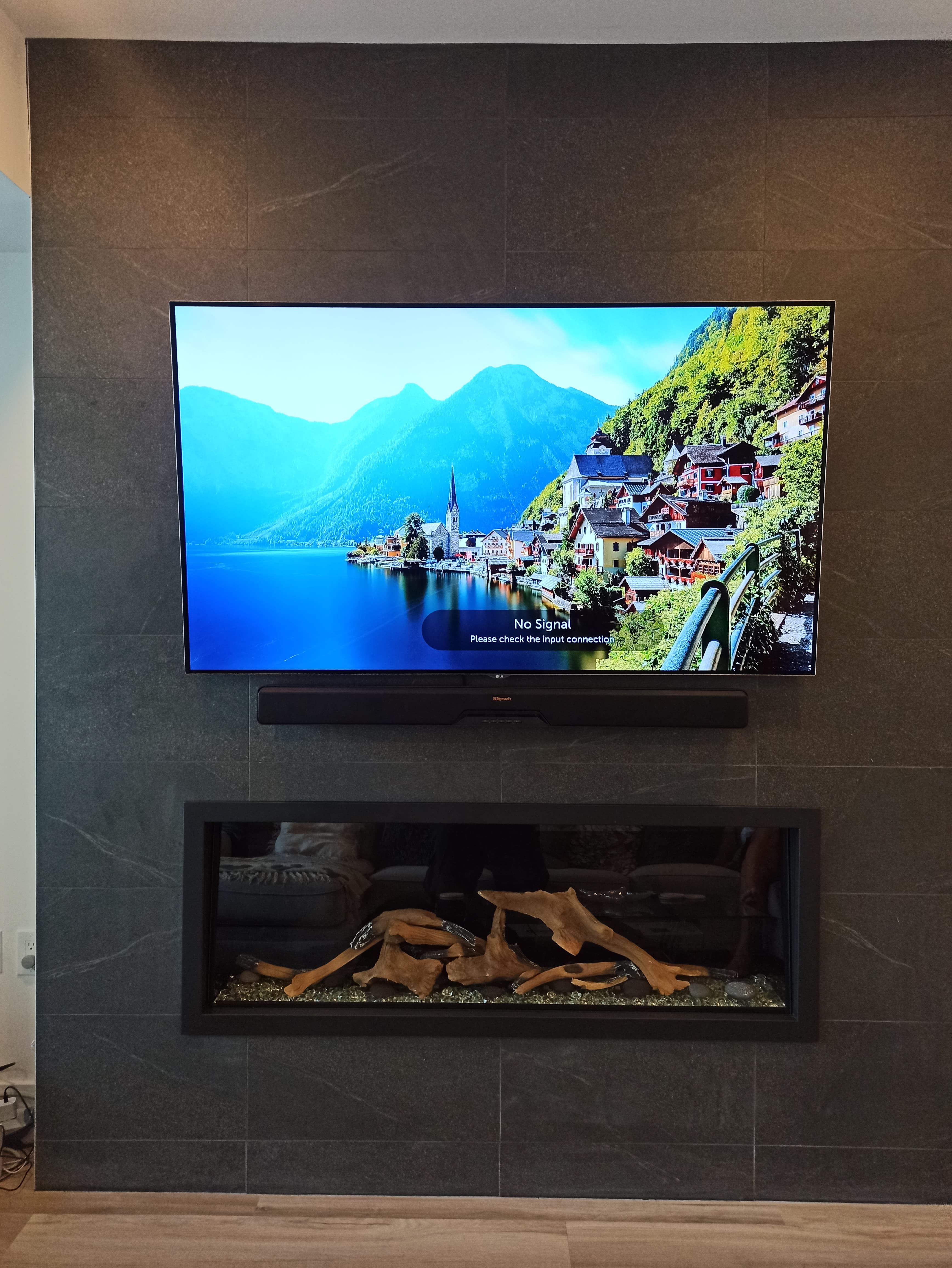 TV installation on dark wall, Winnipeg